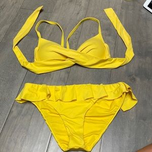 Yellow bikini, woman’s size medium.